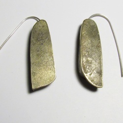 Half Hollow earrings by Roxy Lentz
