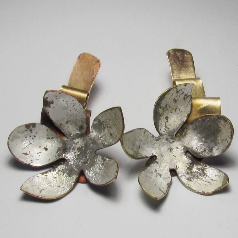 Earrings by Roxy Lentz of brass and re purposed silver plate tray. Wabi sabi.